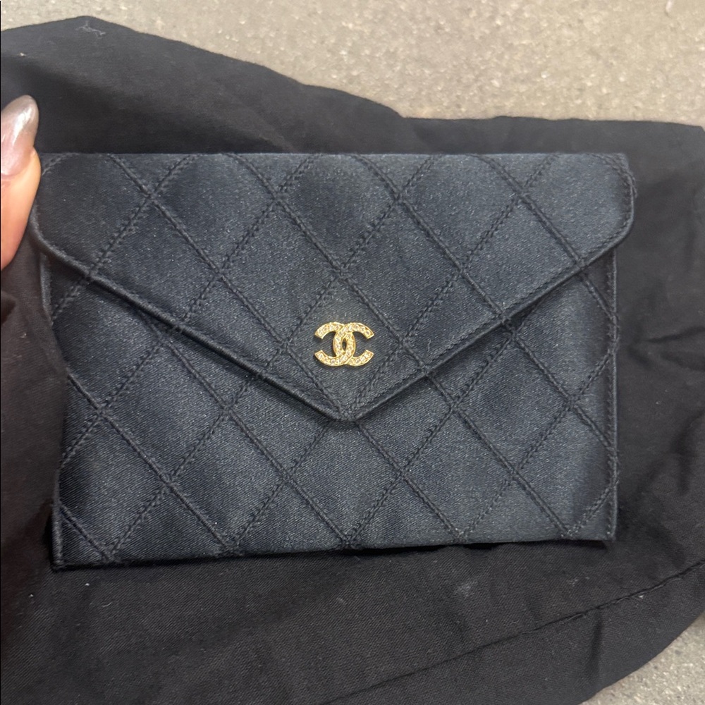 Authentic CHANEL Black Satin Quilted Clutch with Gold Logo